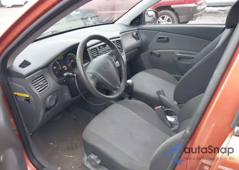 2009 Kia Rio Lx z USA, uszkodzony, nr VIN KNADE223496510008